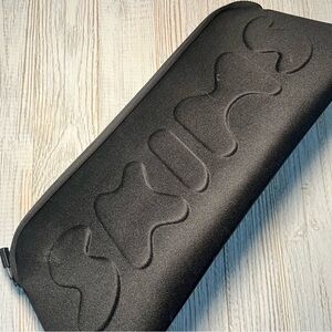 SKIMS Black Embossed Clutch